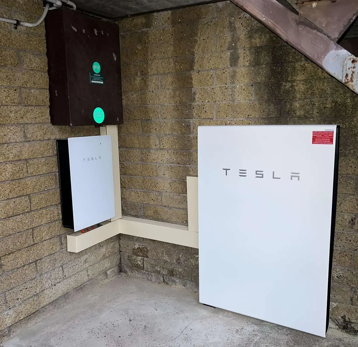 EV charger beside the home battery, garage install