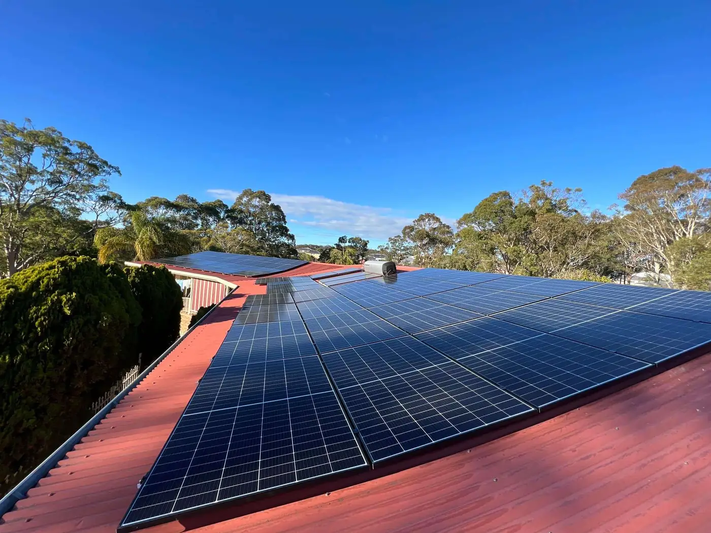 Venux Electrical solar panel installation on a red tile roof