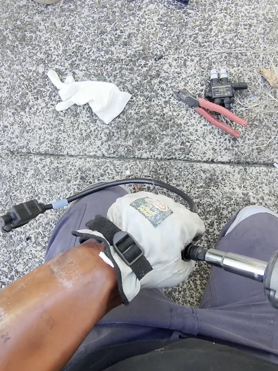 Venux electrician carrying out electrical service connection work