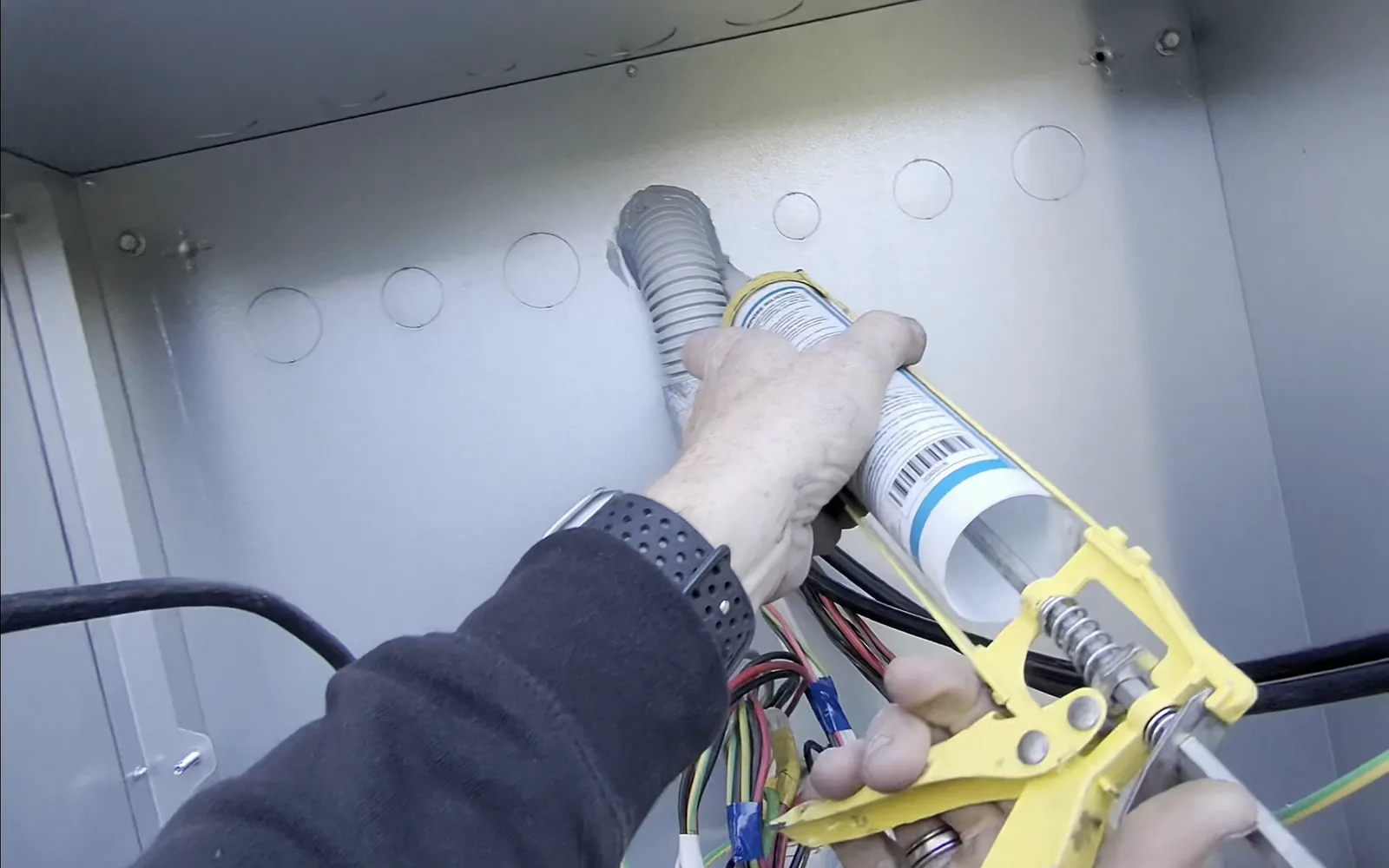 Venux electrician carrying out electrical service connection work