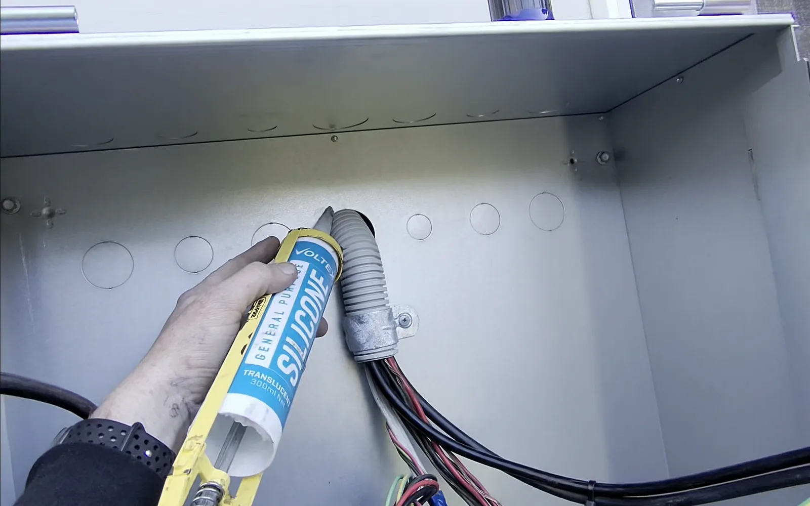 Venux electrician carrying out electrical service connection work