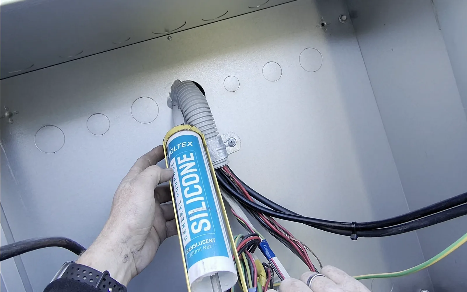 Venux electrician carrying out electrical service connection work