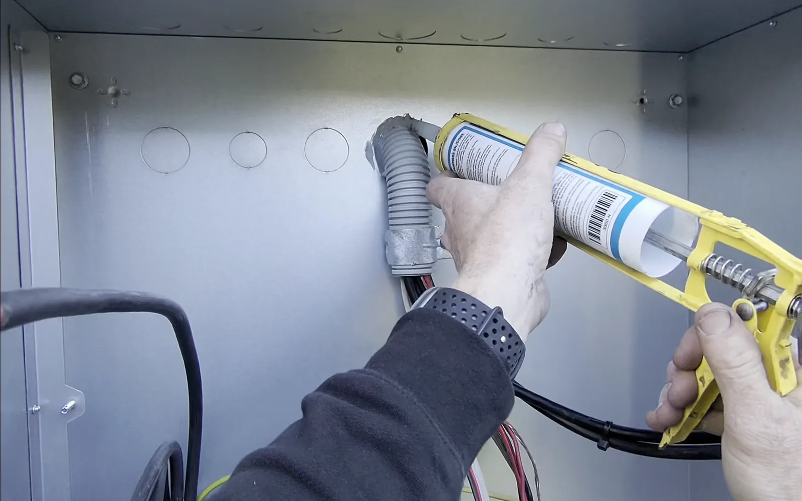 Venux electrician carrying out electrical service connection work