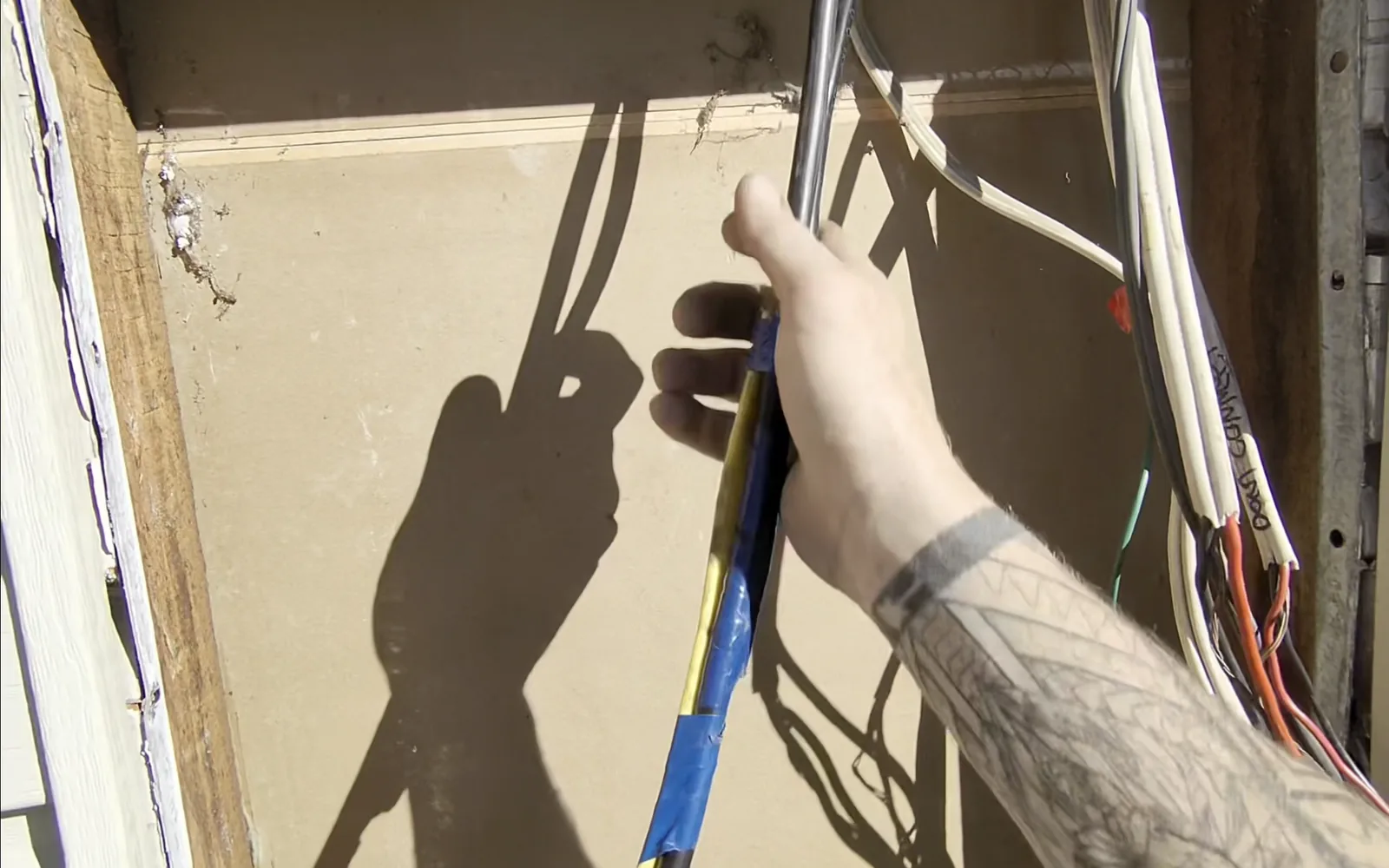 Venux electrician carrying out electrical service connection work